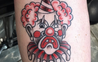 Tattoo of a clown